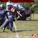 Team Legacy Paige Surber tries to get away from Island Stunnerz Keishanda Taylor.(photo by Bout It Productions)