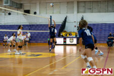 Okkodo Bulldog Jasmine Samson sets high for an attack against the GW Geckos. (Photo by Michael Blas)