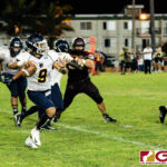 Guam High Panther QB Travon Jacobs on a scramble as he looks for the open receiver. (Photo by Michael Blas)