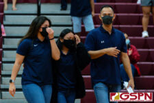 The Academy Cougar Coaches Manny Guarin, Jasie Villanueva, and Marissa Maratita make their way to congratulate their team's victory. (Photo by Michael Blas)