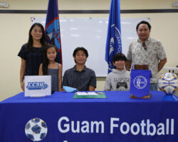 The Halehale family poses for a photo after Kyle Halehale, center in dark patterned shirt, signed an official Acknowledgement of Acceptance to Central Connecticut State University Men's Soccer Program during a three-part signing event Saturday at the Guam Football Association National Training Center Lecture Hall. In the photo are, from left to right, Mi Hae Halehale, Leia Halehale, Kyle Halehale, Sean Halehale, and Carlos Halehale.