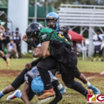 Guam Packers Cohen Blas powers through the defensive line for positive yards. (photo by Bout It Productions)