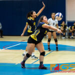 Guam High Panthers Alexii Schoenhais keeps the ball in play during the first set of the game. (Photo by Michael Blas)