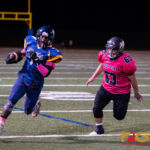 Guam High Panthers Sincere Powell blazes past the Southern High Dolphins defense for the first down and more. (Photo by Michael Blas)