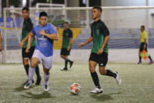 Islanders FC's Noah Duenas moves the ball through the midfield against Sidekicks SC during a Week 11 match of the Budweiser Soccer League Premier Division Friday at the Guam Football Association National Training Center. The Islanders won 6-1.