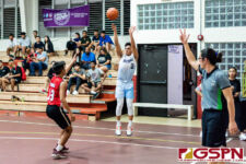 St. Paul Warrior Audrey Dela Cruz scores from beyond the arc in the first quarter of the game. (Photo by Michael Blas)