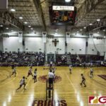 The Fd Friars host the Harvest Eagles in their volleyball matchup held at the Phoenix Center. The Friars go on to eventually take the win. (photo by Bout It Productions)