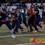 Guam High Panthers Julius Gaduang finds the hole and drives the ball forward in the third quarter of the game. (Photo by Michael Blas)