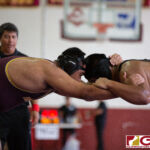 High School wrestlers hit the mats in a Preseason Tournament held at the FD Jungle. (photo by Bout It Productions.)
