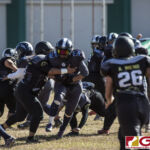 Island Stunnerz Melanie Manglona powers through the defense for positive yardage. (photo by Bout It Productions)