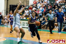 Okkodo Bulldog Vanezza Gustilo drives towards the basket while Academy Cougar Katana Guerrero posts up. (Photo by Michael Blas)