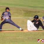 Guam High Panthers Jevon White is too late to base as Simon Sanchez Sharks Daven Meno slides in safely. (Photo by Michael Blas)