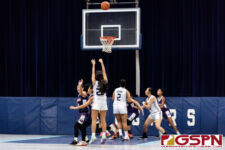 Academy Cougar Annika Almario sinks in a three pointer in the third quarter of the game. (Photo by Michael Blas)