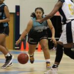 Dolphin Mariah Iriarte looks for an opening against the Panther perimeter defense. (photo by Robert Balajadia)