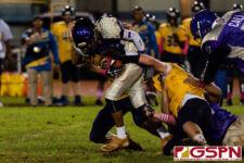 GW Gecko Eian Naputi breaks through the Guam High Panther defense for a touchdown. (Photo by Michael Blas)