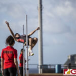 This Friday's IIAAG Track & Field Meet moves to the ocean scenery of J.F.K High. The sweltering heat was on but the fans and athletes still put on a show. (photo by Bout It Productions)