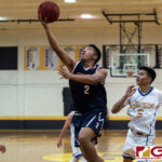 Okkodo Bulldogs Jon Michael Lorena makes his way towards the basket for a layup. (Photo by Michael Blas)