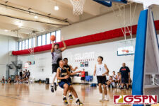 GW Gecko Franklin Ninete Jr. powers down the middle for a shot at the basket. (Photo by Michael Blas)