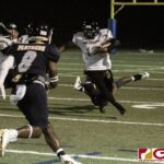 JFK Islanders Jacobe Quinata gets by the Panthers defense for extra yardage. (photo by Bout It Productions)
