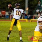FD Friar's QB Nicholas Anderson launches a deep one to his brother, WR Brian Anderson. (Photo By Michael Blas)