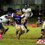 George Washington Geckos Shelby Meeks breaks through several tackles to gain huge yardage. (Photo by Michael Blas)