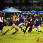 Friar's Noah Diaz tries to get past Gecko's defensive end #24 Devin Benevente. (Photo by Michael Blas)