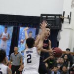 Bulldog Kevin Cabral tries to get a difficult off-hand layup to go in the second half. (photo by Robert Balajadia)