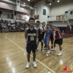 GDOE Public School Hendrix De Fiesta pose for the camera after hitting the go-ahead 3 pointer for the win. (photo by Bout It Productions)