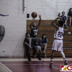 San Vicente Braves Daethan Alcantara shoots from beyond the arc while Miles Ganeb attempts to deny the shot. (photo by Bout It Productions)