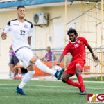 Guam Matao Defender Travis Nicklaw defends against Maldives Midfielder Mohamed Naim. (Photo by Michael Blas)