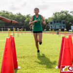JFK Islander Mya Tolerson finishes first for the girls overall with a time of 21:19. (Photo by Michael Blas)