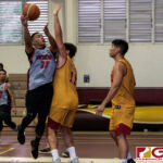 Southerns Roque Charfarous powers in for a layup in the Coors All Island Alumni Tournament playoff game. (Photo by Michael Blas)