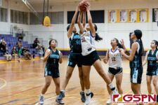 Southern Dolphin Allyx Guerrero and Gecko Amanda Uncangco fight for a rebound midway in the first quarter. (Photo by Michael Blas)