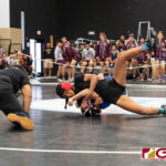 Tiyan Titans Tiara Fernandez defeated Academy Cougars Reese Gutierrez to get gold in the 97 pound division. (Photo by Michael Blas)