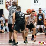 Rob Leon Guerrero and Steve Gatewood on the tip off to start the FD Alumni Tournament Championship Game. (Photo by Michael Blas)