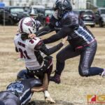 Team Legacy's Kaylani Plain Cruz finds herself caught up between two Island Stunnerz surging defenders. (photo by Bout It Productions)