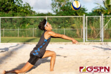 St. Paul Warriors Keith Nauta extends for a bump on the ball in the second set of the match. (Photo by Michael Blas)