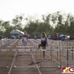 This Friday's IIAAG Track & Field Meet moves to the ocean scenery of J.F.K High. The sweltering heat was on but the fans and athletes still put on a show. (photo by Bout It Productions)
