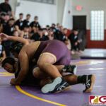 High School wrestlers hit the mats in a Preseason Tournament held at the FD Jungle. (photo by Bout It Productions.)