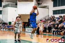 St. Paul Warrior Audrey Dela Cruz pops for two points in the second quarter of the game. (Photo by Michael Blas)