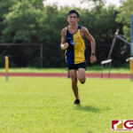 GW Gecko Paul Mansfield on the final stretch to finish second place overall with a time of 18:19. (Photo by Michael Blas)