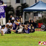 GW Gecko Eian Naputi leaps into the end zone after making the catch from QB Ricky Macias. (Photo by Michael Blas)
