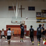 Harvest Eagle Calvin Laxamana connects with the ball against the FD Friars. ( Photo by Bout It Productions )