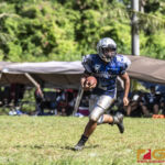 Southern Cowboys Michael Jesus carries the ball looking for a clear path downfield. (photo by Bout It Productions)