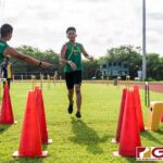 JFK Islander Joseph Aguon crosses the finish line in third overall and first for his team with a time of 18:47. (Photo by Michael Blas)