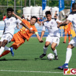 Bhutans Karma Shedrup Tshering falls while fighting for possession against Guams Ian Mariano and Shane Malcolm. (Photo by Michael Blas)