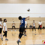 Okkodo Bulldog Adam Gimenez stretches out for the delivery against the Tiyan Titans. Photo by Bout It Productions.