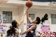 Okkodo Bulldog Vanezza Gustilo shoots a floater while Academy Cougar Annika Almario contests. (Photo by Michael Blas)