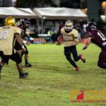 Tiyan Titans Kio Kaminanga gains yardage after a kick off from the Father Duenas Friars. (Photo by Michael Blas)