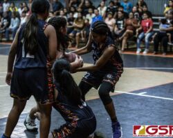 Untalan Wildcats Joie Naia Almoguera finds herself surrounded by aggressive Roadrunners. (photo by Bout It Productions)